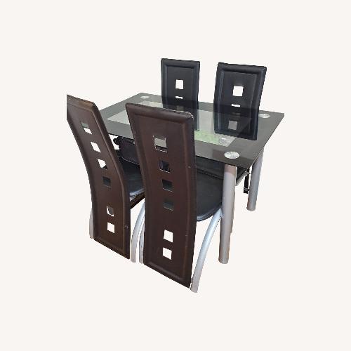 Used Glass Table with Leather Seats for sale on AptDeco