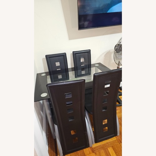Used Glass Table with Leather Seats for sale on AptDeco