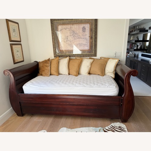 Used Pottery Barn Twin Sleigh Bed with Trundle  for sale on AptDeco