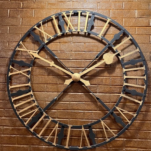 Used Ethan Allen 42” Iron Decorative Wall Clock for sale on AptDeco