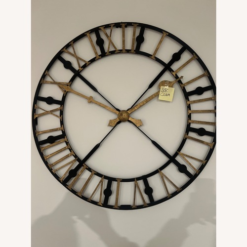 Used Ethan Allen 42” Iron Decorative Wall Clock for sale on AptDeco