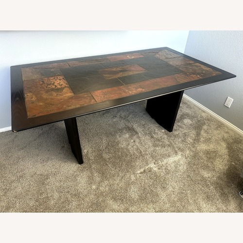 Used Mid-Century Modern Slate Stone Dining Table for sale on AptDeco