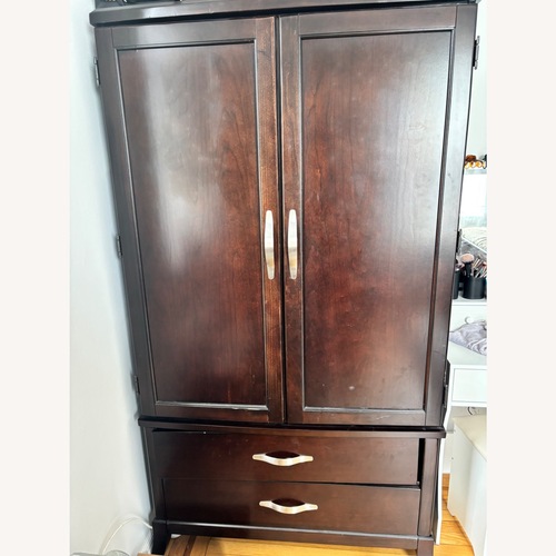 Used Wooden Armoire for Storage for sale on AptDeco