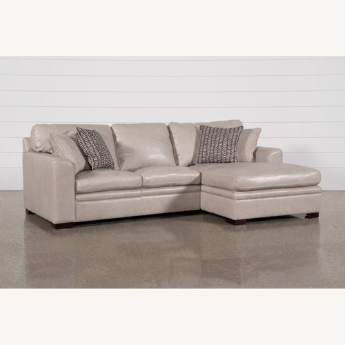 Used Living Spaces Leather Sofa for sale on AptDeco