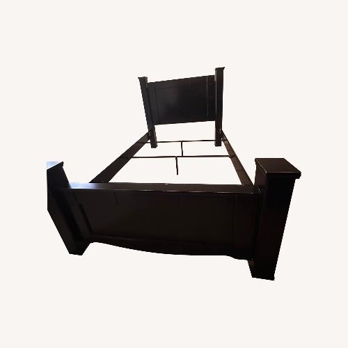 Used Dark Brown Wood Queen Bed Frame for sale on AptDeco