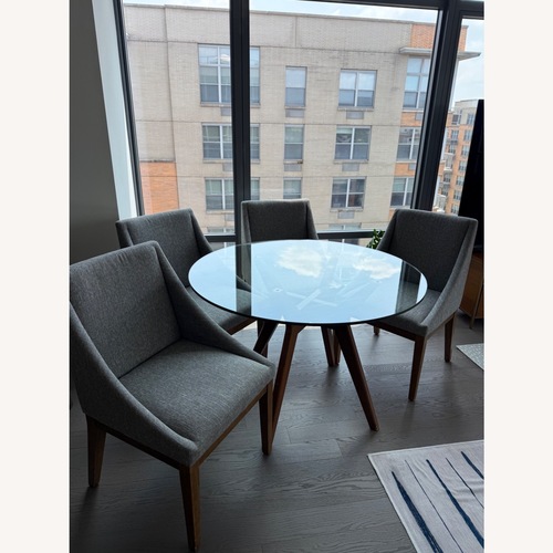 Used West Elm Light Grey Upholstered Dining Chair for sale on AptDeco