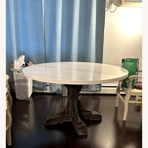 Used Canora Grey Marble Top Circular Table on Pedestal for sale on AptDeco