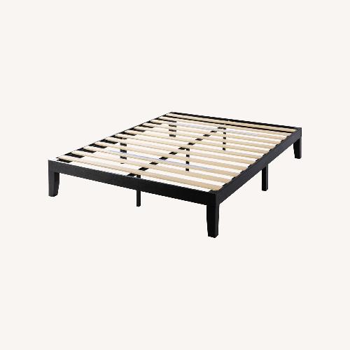 Used Black Queen Wooden Platform Bed Frame for sale on AptDeco