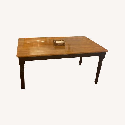 Used Courtdale Solid Wood Dining Table for sale on AptDeco