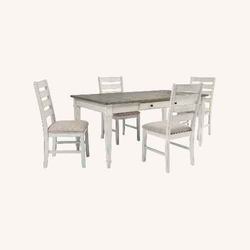 Used Dining Table with Built-in storage and 4 Chairs for sale on AptDeco
