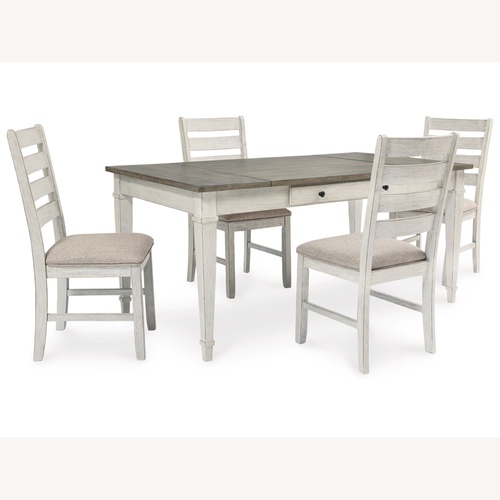 Used Dining Table with Built-in storage and 4 Chairs for sale on AptDeco