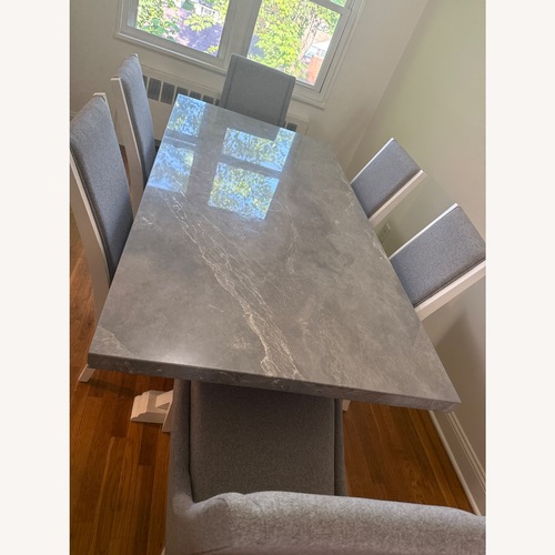 Used Light Grey Marble Dining Table for sale on AptDeco