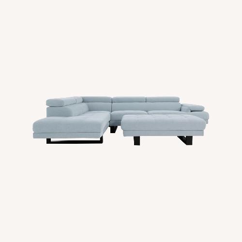 Used Avalon Light Blue 123'' 2 Piece Sectional with Ottoman for sale on AptDeco