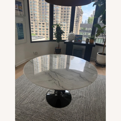 Used Genuine Marble Table, Black Metal Stand (48in) for sale on AptDeco