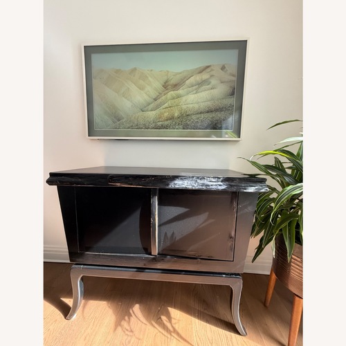 Used Black Wood Side Table with Natural Edge for sale on AptDeco