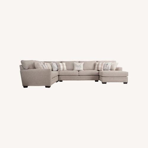 Used Cottage Chic Beige Sectional Sofa with Chaise for sale on AptDeco