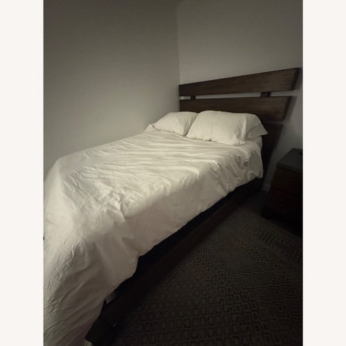 Used Raymour & Flanigan Santa Cruz Queen Bedframe for sale on AptDeco