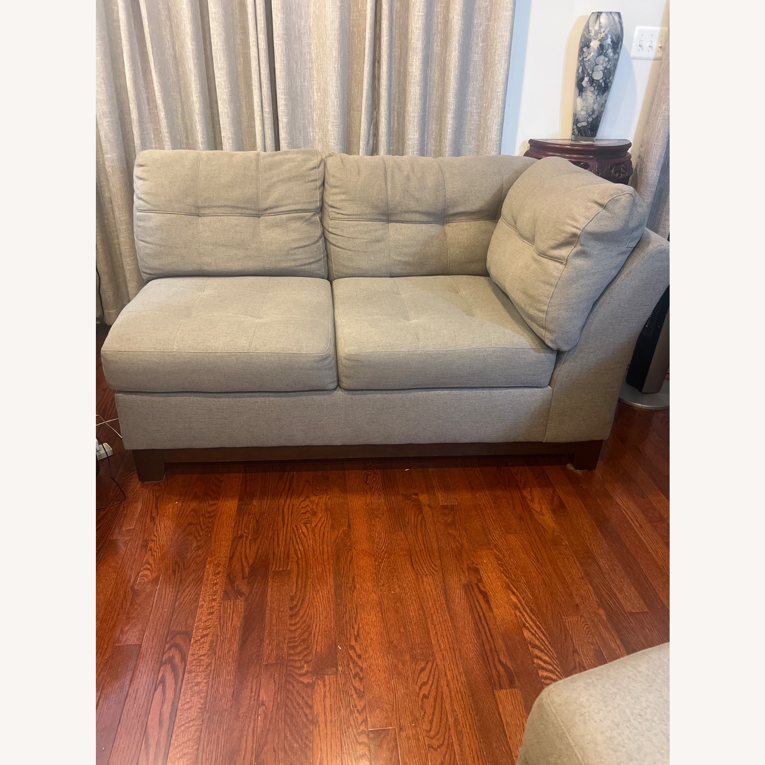 Medium grey two piece sectional with ottoman.   - image-2