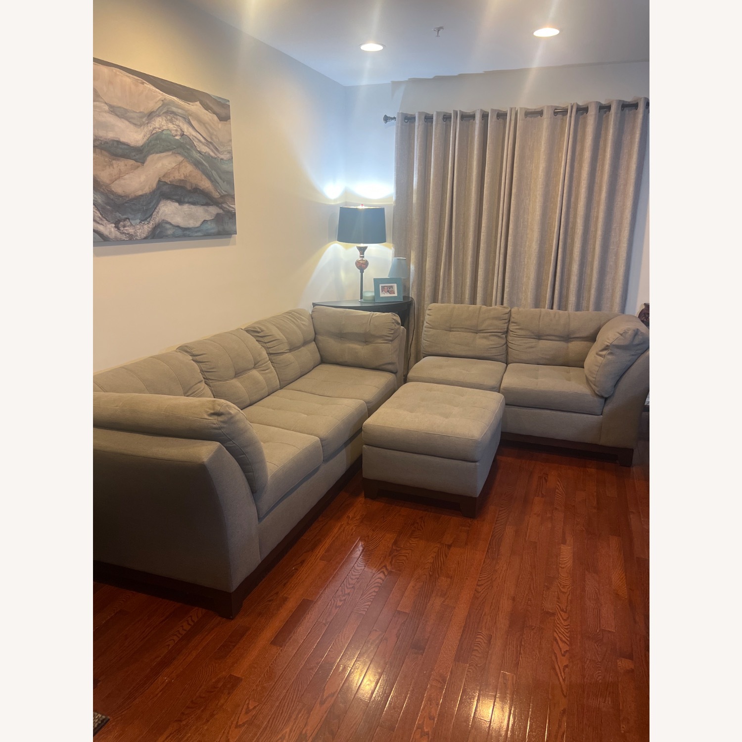Medium grey two piece sectional with ottoman.   - image-3