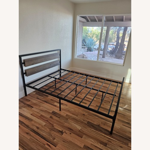 Used Full Size Black Metal Platform Bed for sale on AptDeco