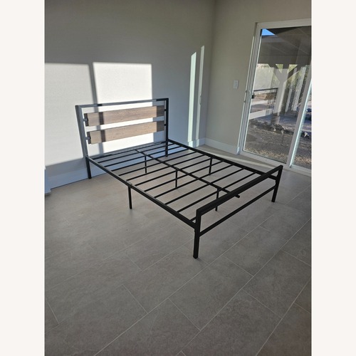 Used Full Size Black Metal Platform Bed for sale on AptDeco