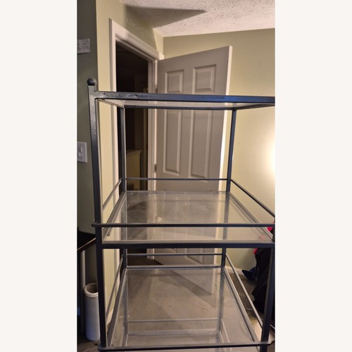 Used Amhold Glass Dining Cabinet – Sleek & Modern for sale on AptDeco