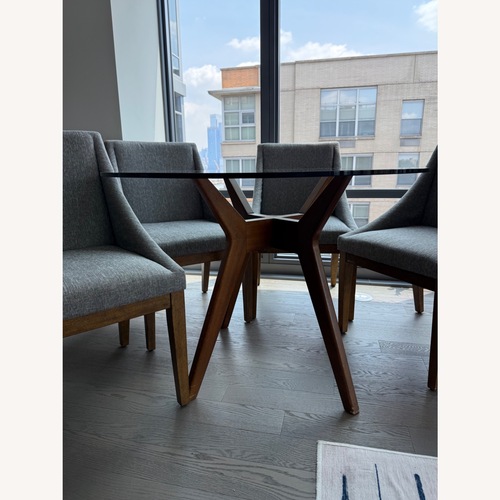 Used West Elm Jensen Glass Round Dining Table for sale on AptDeco
