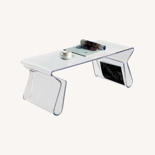 Used Clear Acrylic Coffee Table with Magazine Storage for sale on AptDeco