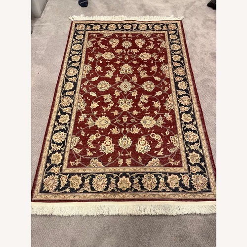 Used Red, Tan and Black Rug for sale on AptDeco