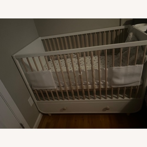 Used IKEA Myllra Crib With Organizer for sale on AptDeco