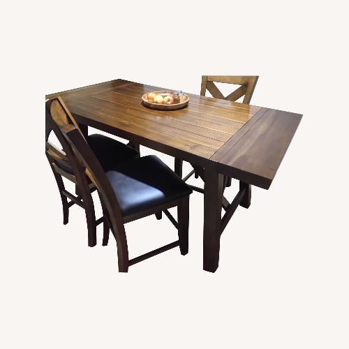 Used Dark Brown Wood Dining Set for 4 People for sale on AptDeco