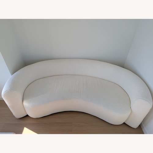 Used Hugger Curved Boucle Sofa by Leanne Ford for sale on AptDeco