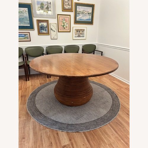 Used CB2 Salamina Round Rattan-Wrapped Wood Dining Table for sale on AptDeco