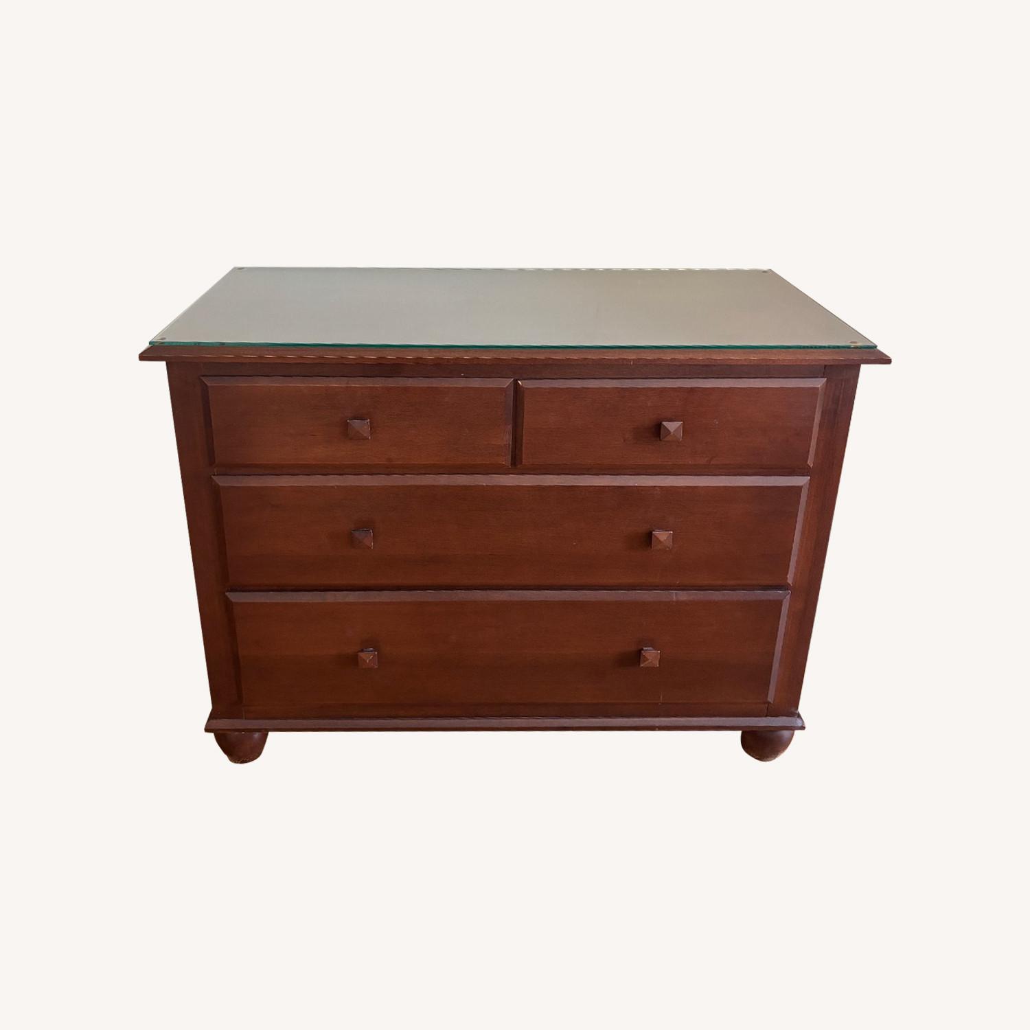 Sturdy Wooden Dresser With Glass Top - image-0