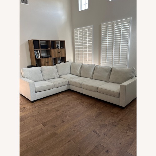 Used Living Spaces L-Shaped Sectional for sale on AptDeco
