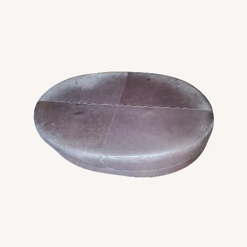 Used Thomasville 2003 Oval Leather Ottoman  for sale on AptDeco