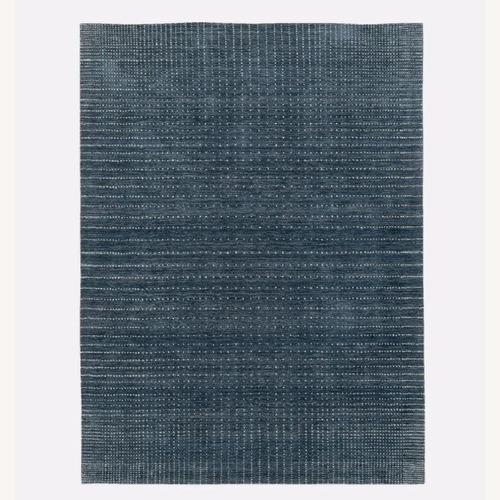 Used West Elm Graduated Dot Wool Rug (Navy Blue) for sale on AptDeco
