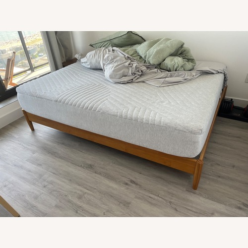 Used Midcentury Wood Bedframe for sale on AptDeco