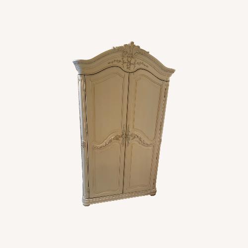 Used Natural Color Wood Armoire for sale on AptDeco
