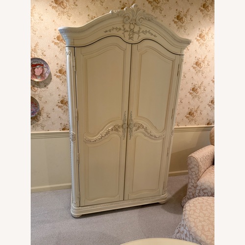 Used Natural Color Wood Armoire for sale on AptDeco