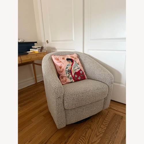 Used Babyletto Madison Swivel Glider Nursery Chair for sale on AptDeco