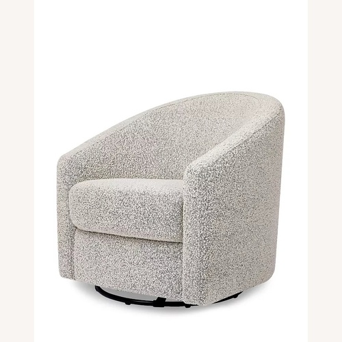 Used Babyletto Madison Swivel Glider Nursery Chair for sale on AptDeco