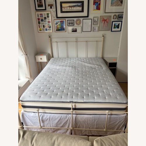 Used Pottery Barn Claudia Queen Bed Frame for sale on AptDeco