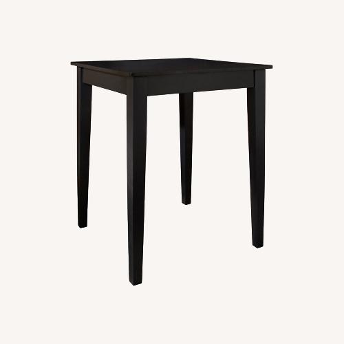 Used Black Wood Square Dining Table for sale on AptDeco
