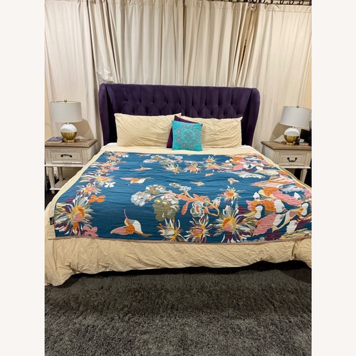 Used Skyline Purple Velvet King Tufted Wingback Bed for sale on AptDeco