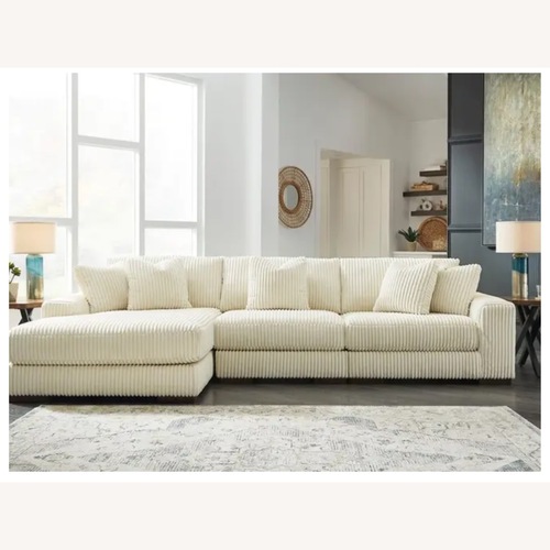 Used 3 Piece Cream Sectional  for sale on AptDeco