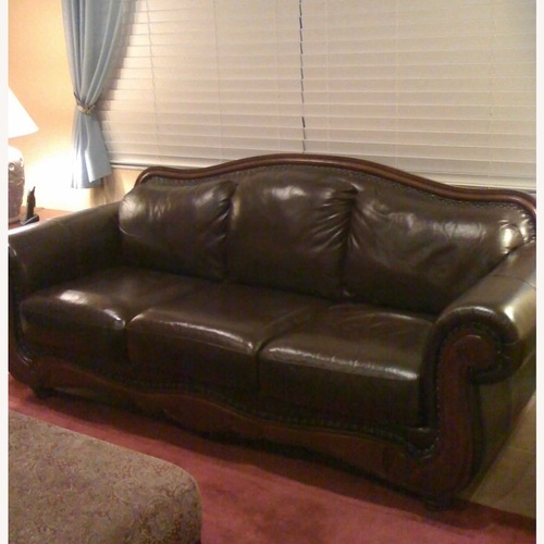 Used Chocolate Color Leather Camel Back Style Sofa for sale on AptDeco