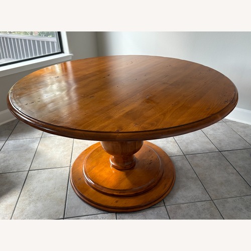 Used Hourglass Wood Coffee/Kitchen Table for sale on AptDeco