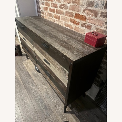 Used Rooms To Go Wood Dresser for sale on AptDeco