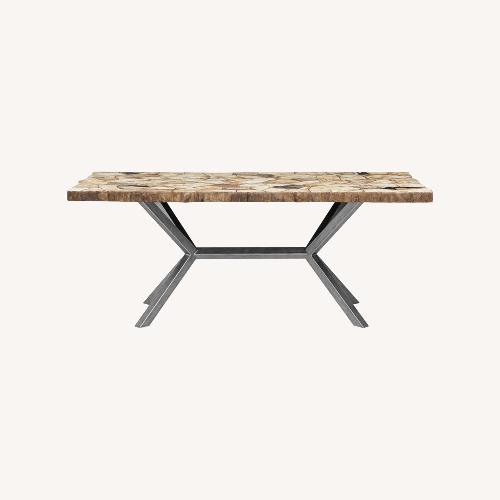 Used Arhaus Petra Dining Table Petrified Wood for sale on AptDeco